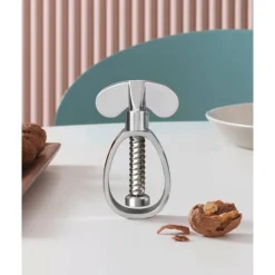 Kuschelige Winterzeit<Alessi Nussknacker Farfalla Edelstahl